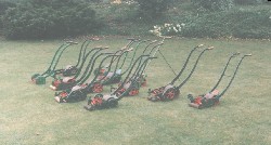 Twelve hand mowers made between 1855-1900